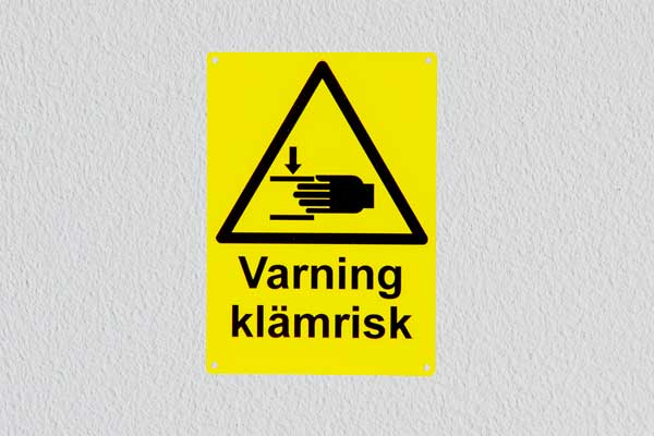 Varningsskylt, klämrisk